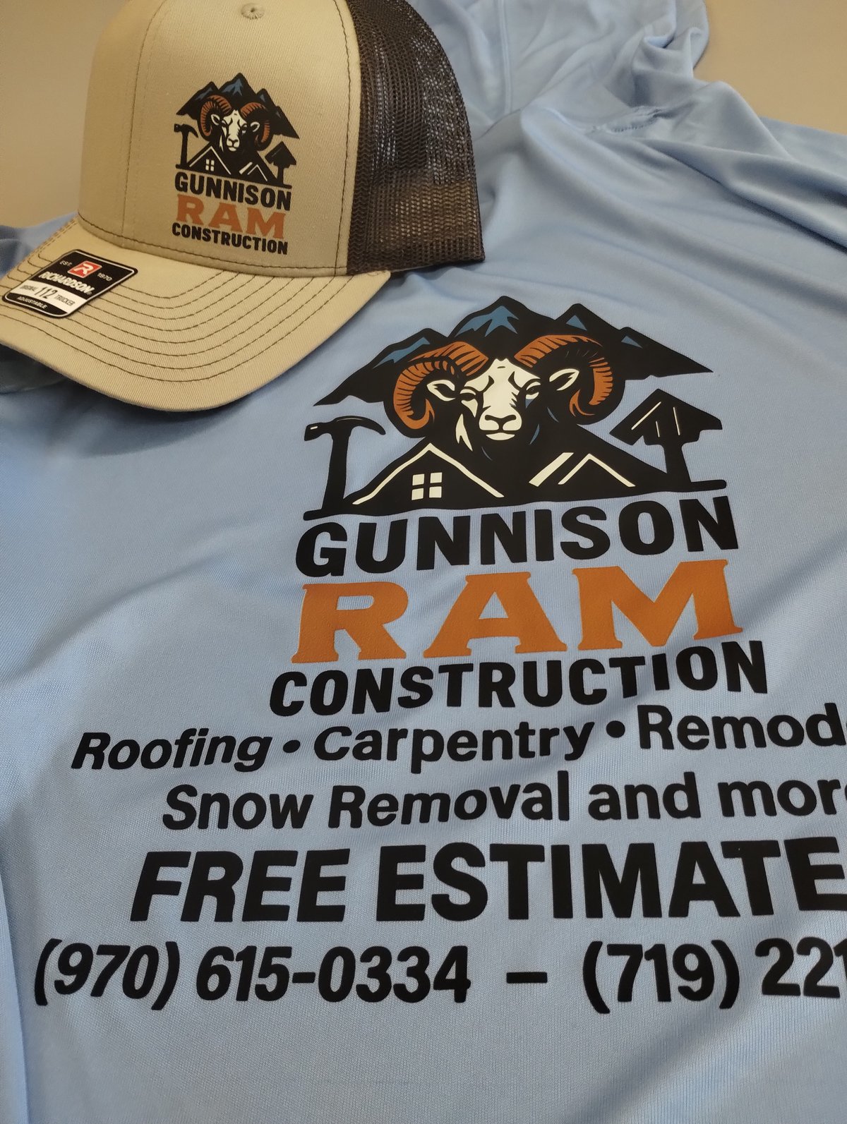 Custom hooded performance shirt and hat for Gunnison Ram Construction