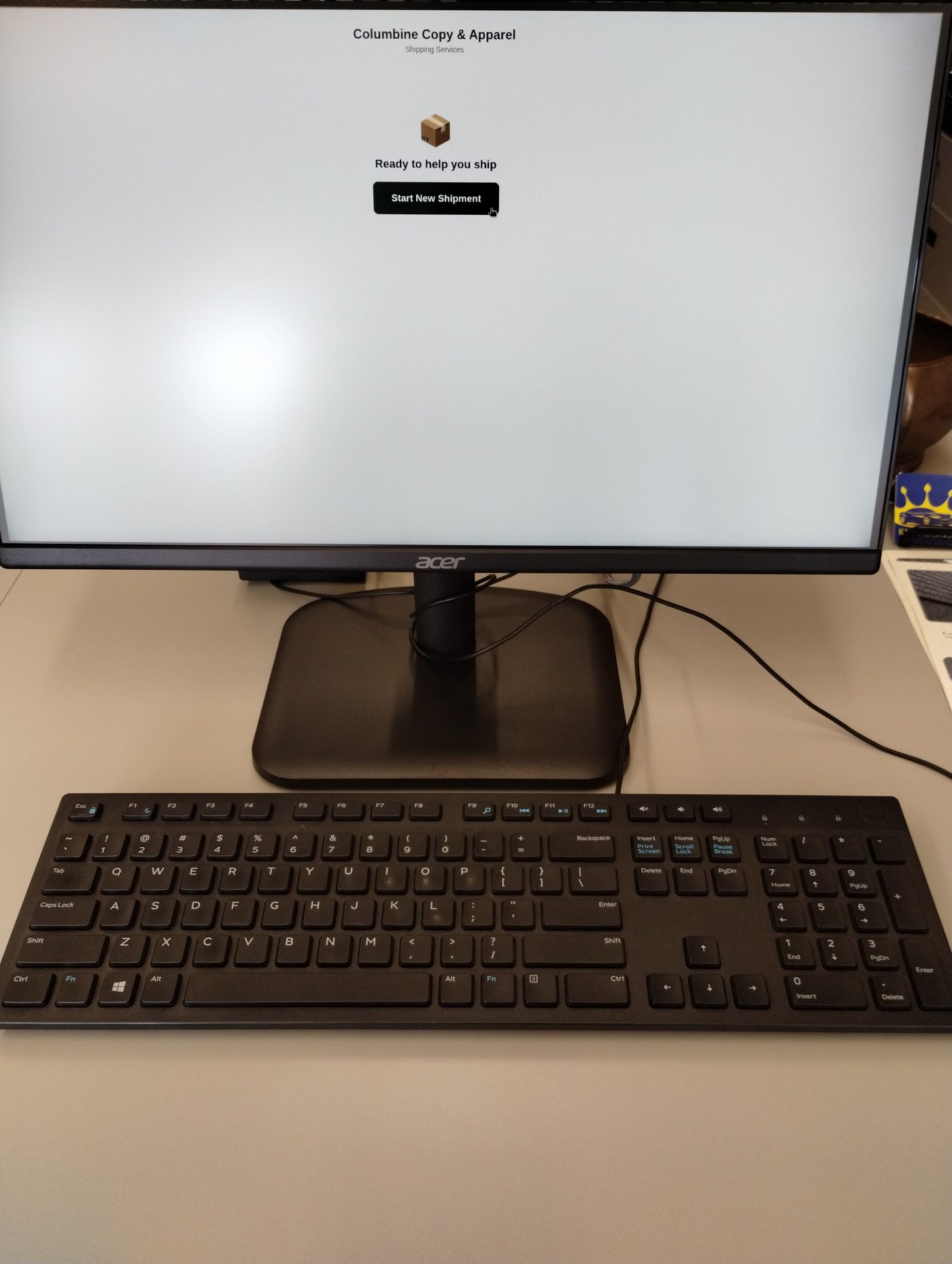 Self-serve shipping kiosk at Columbine Copy & Apparel, showing the Start New Shipment screen