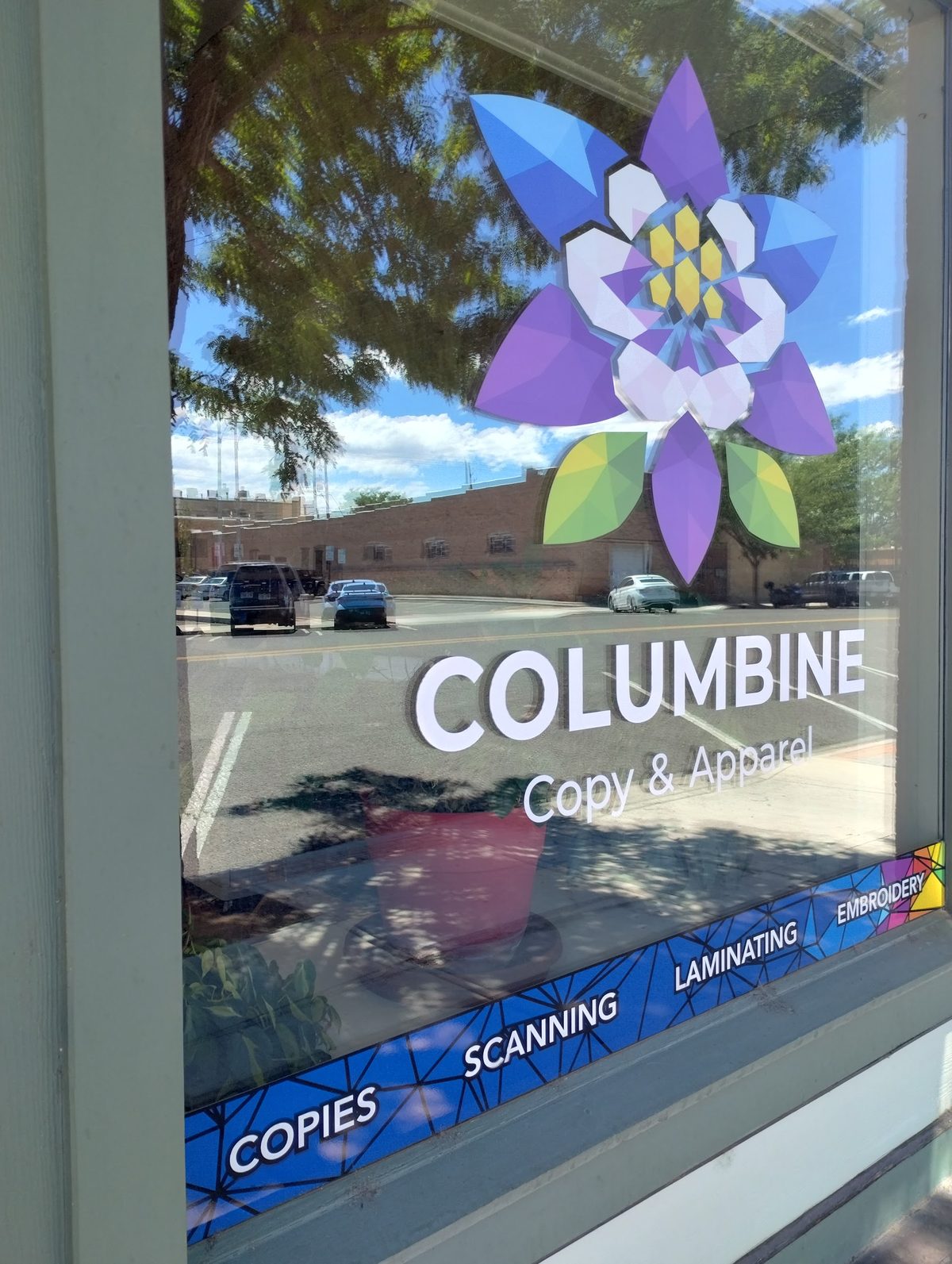 Columbine Copy & Apparel storefront in downtown Montrose, Colorado